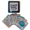 Cheeriosity card game with colorful question cards spread out.
